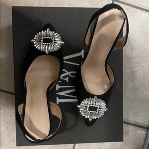 Elegant Black Women's Shoes with Silver Embellishments